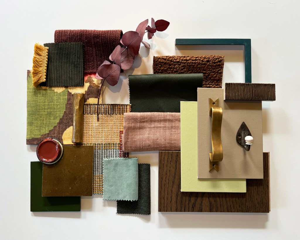 A mood board featuring a variety of fabric swatches and colour samples in earthy tones, including mocha browns, sage greens, and toasted neutrals, along with decorative elements like a golden handle and a sprig of eucalyptus.